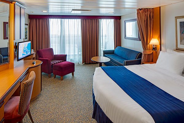 Cruise cabin with twin beds and ocean-view window