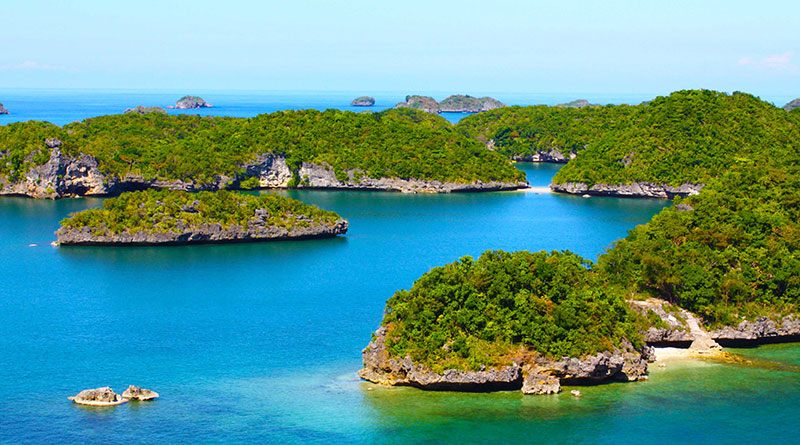 Aerial view of a tropical island coastline